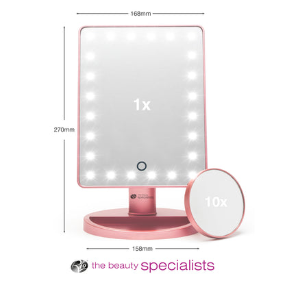 The Rio Rose Gold 24 LED Makeup Mirror features a mini removable 10X Magnifying Mirror, measures 270mm x 168mm, and displays “The Beauty Specialists” logo and text at the bottom.